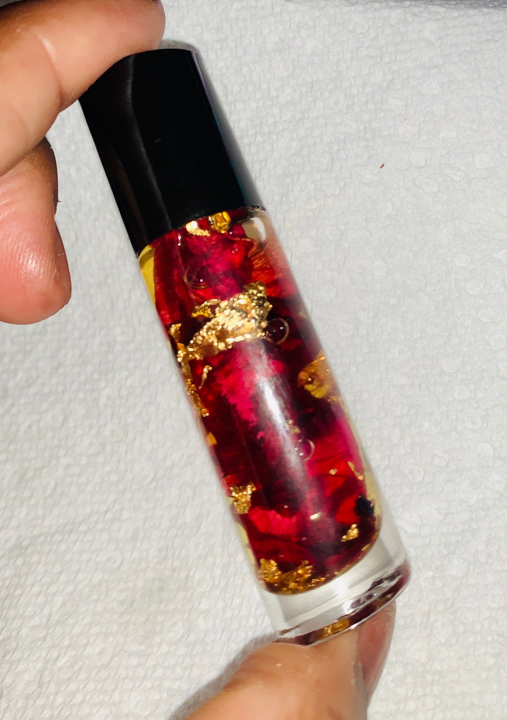 Rose Oil Lip Serum infused with gold flakes